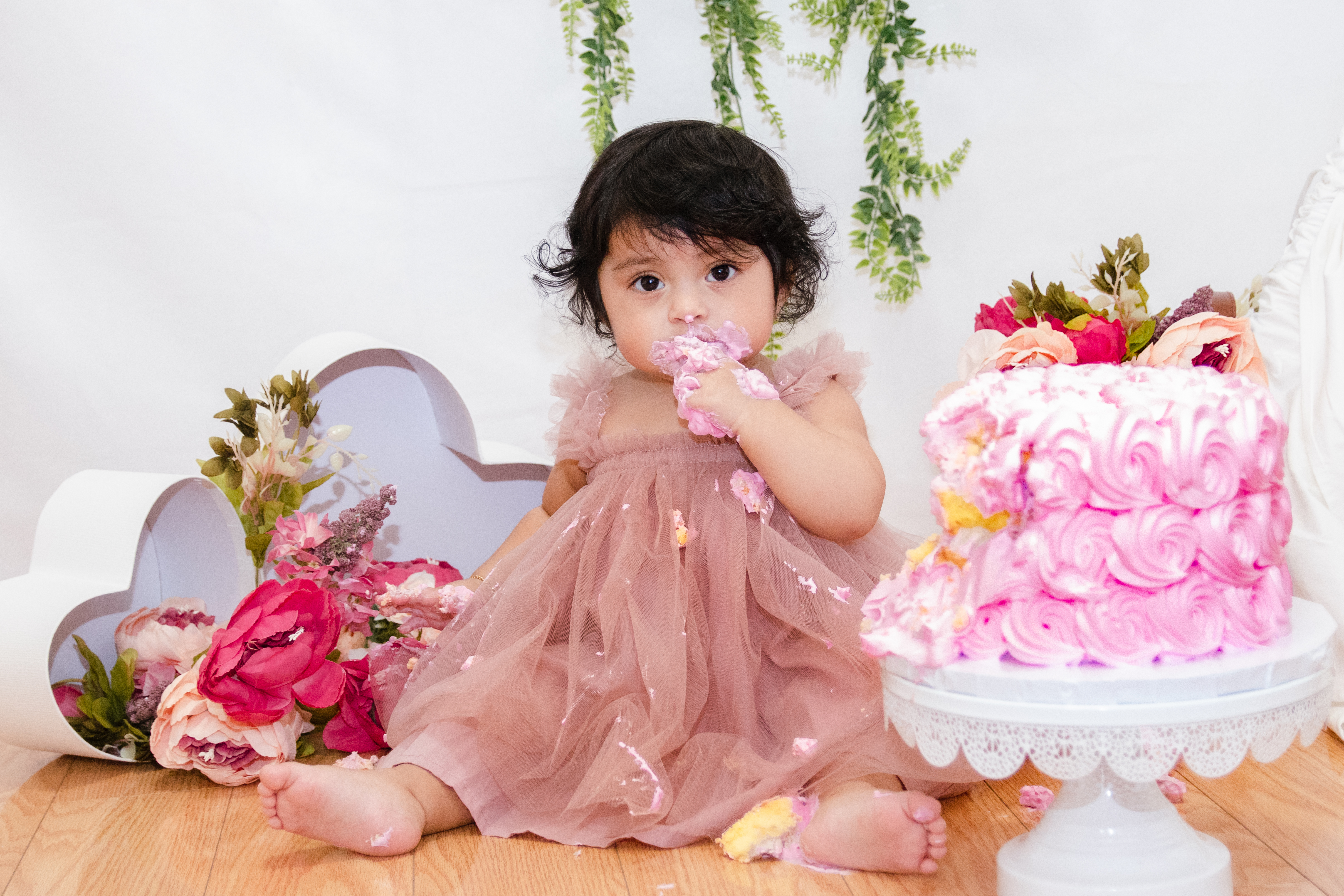 Photo of baby eating cake