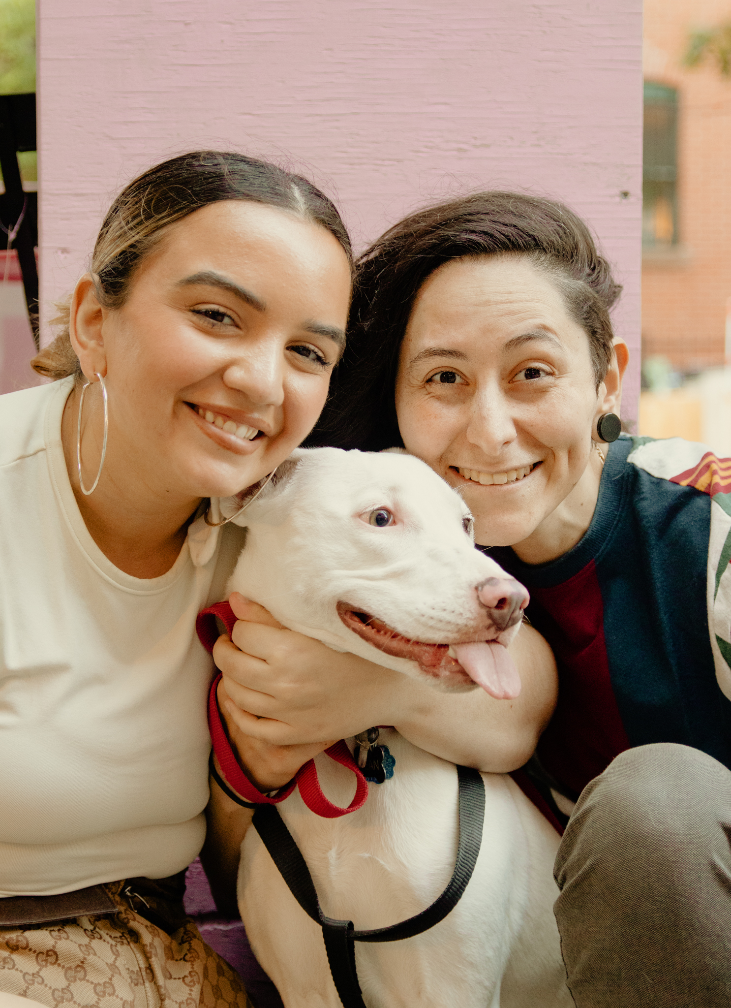 Portrait of couple with puppy